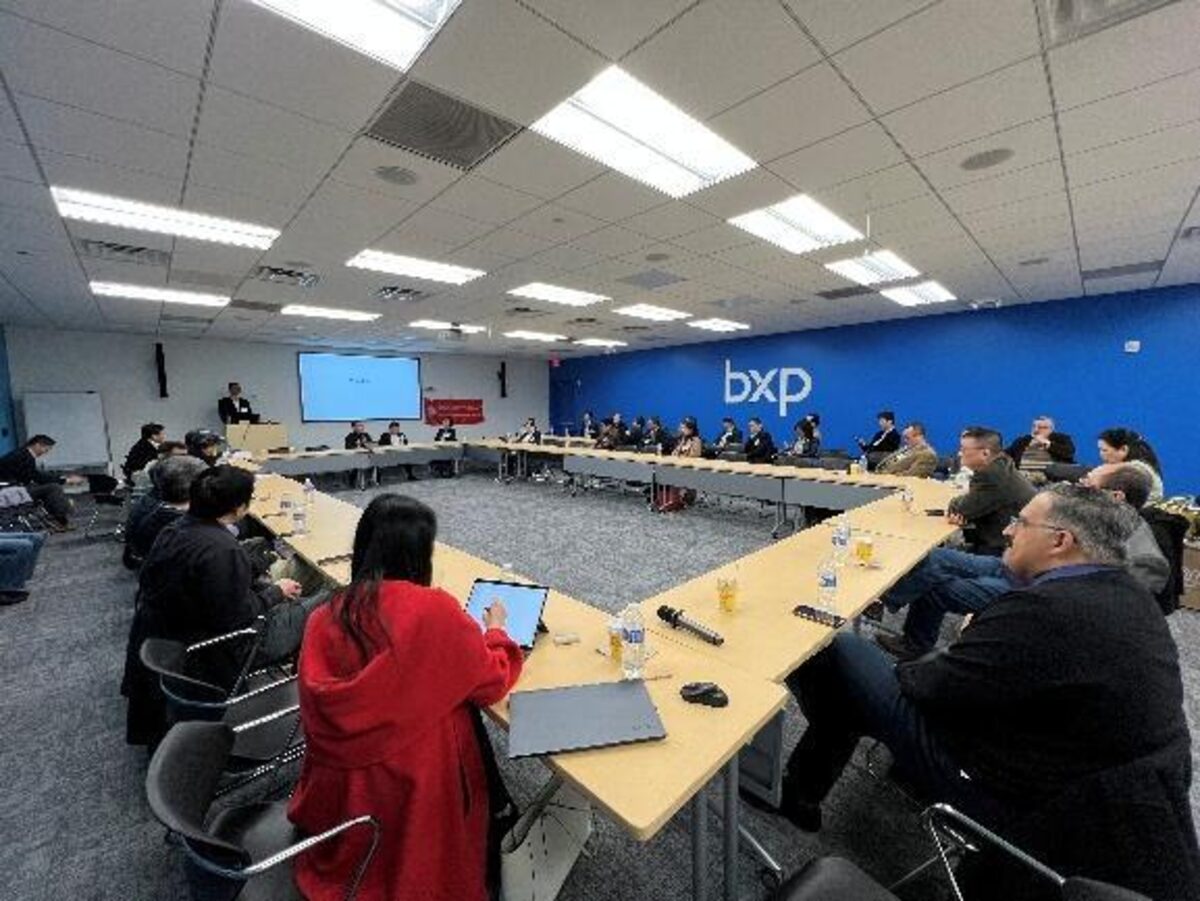 Executive Forum participants seated around a conference table at the bxp Princeton venue