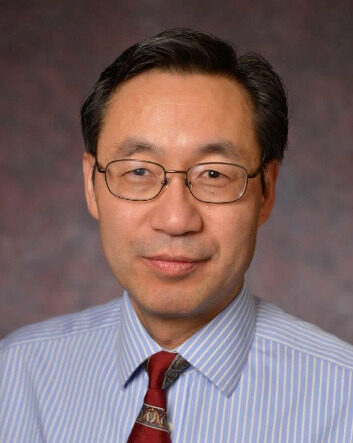 Headshot of Professor Longqin Hu