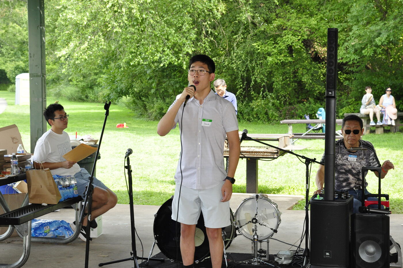 An attendee singing alongside the band.
